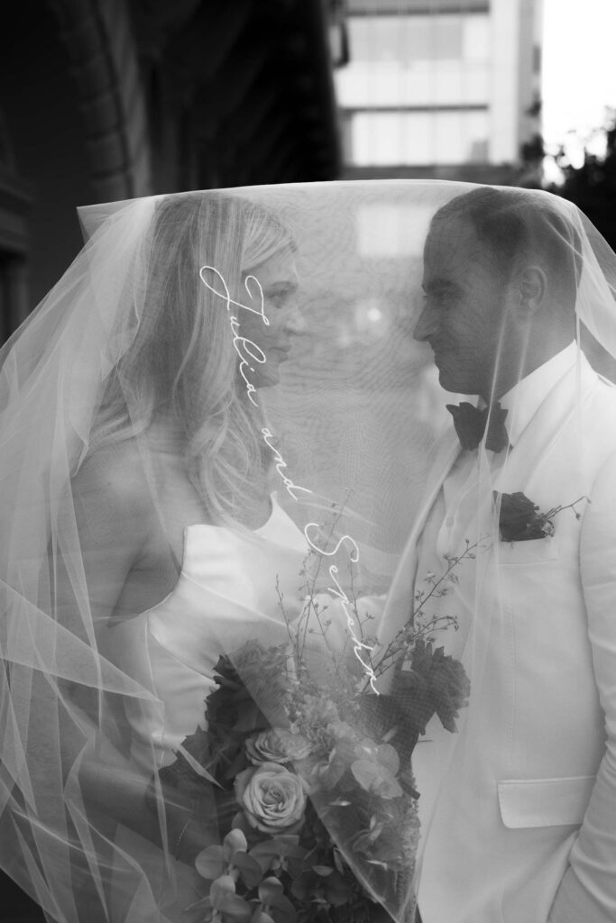 Bride and groom under veil, Como The Treasury Wedding Photographer Paul Winzar